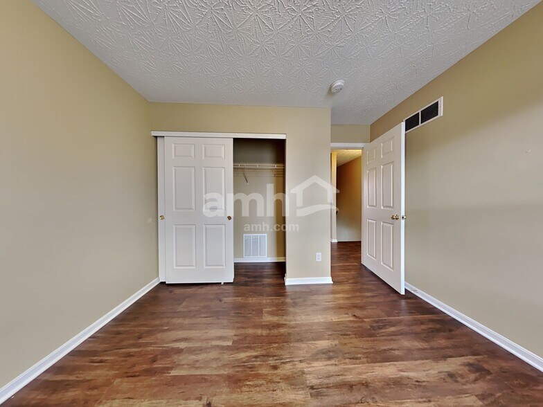 Building Photo - 8888 Woolstone Ct