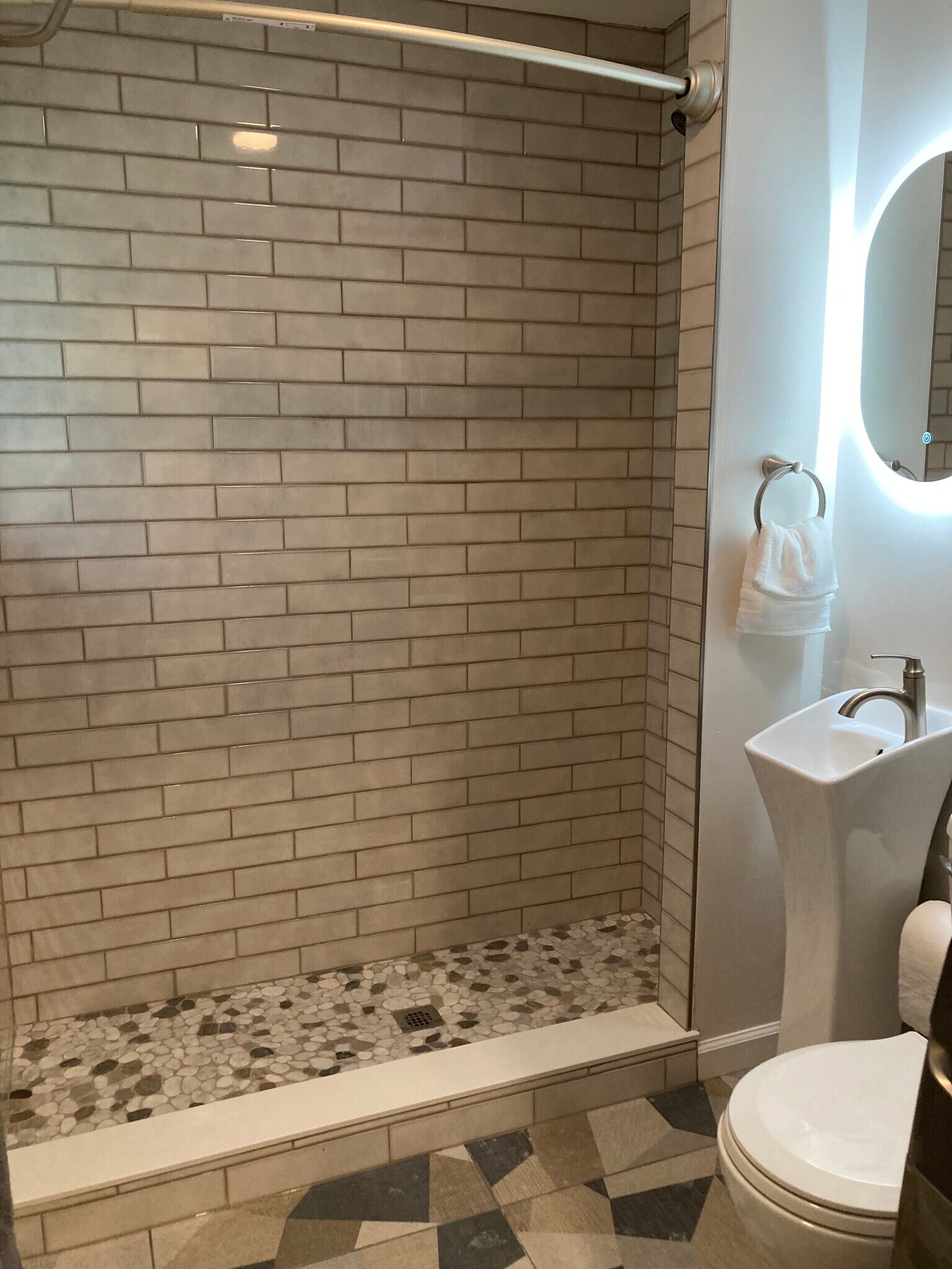 Beautiful tiles in first floor bathroom shower - 1417 N Hamilton Ave