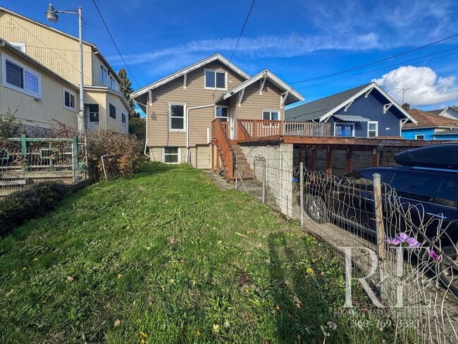 Building Photo - Light-Filled Home with Vaulted Ceilings, Bonus Basement & Walkable Location