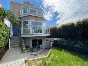Building Photo - Coastal Living at Its Best – 4BR with Ocea...