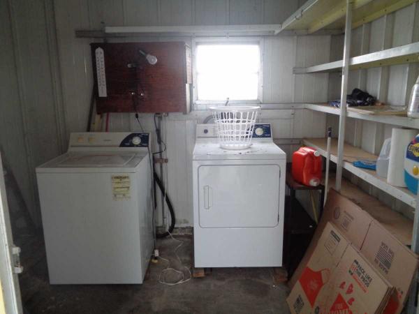 WASHER AND DRYER IN SHED - 7434 Demure Ln