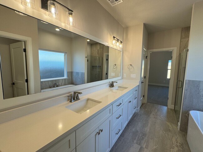 Building Photo - BRAND NEW - 4 bed - 3 bath - 2 car with fenced yard!