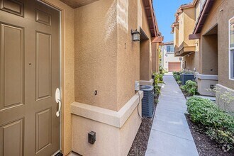 Building Photo - 3 Bedroom 2 1/2 Bath Condo with yard and g...