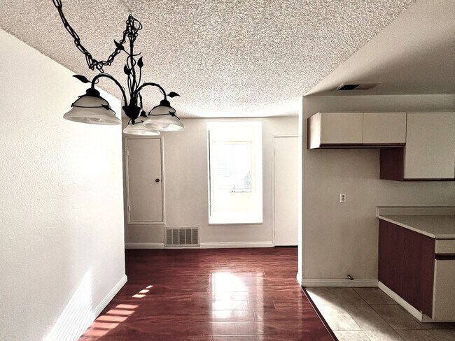 Building Photo - 2 Bedroom, 2 Bath Upstairs Condo with Private Balcony & 2-Car Garage, Gated Community, Water/Tras...