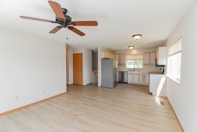 Building Photo - Updated 3BR Split-Level Home with Huge Deck, Fenced Yard & 2-Car Garage Near I-29!
