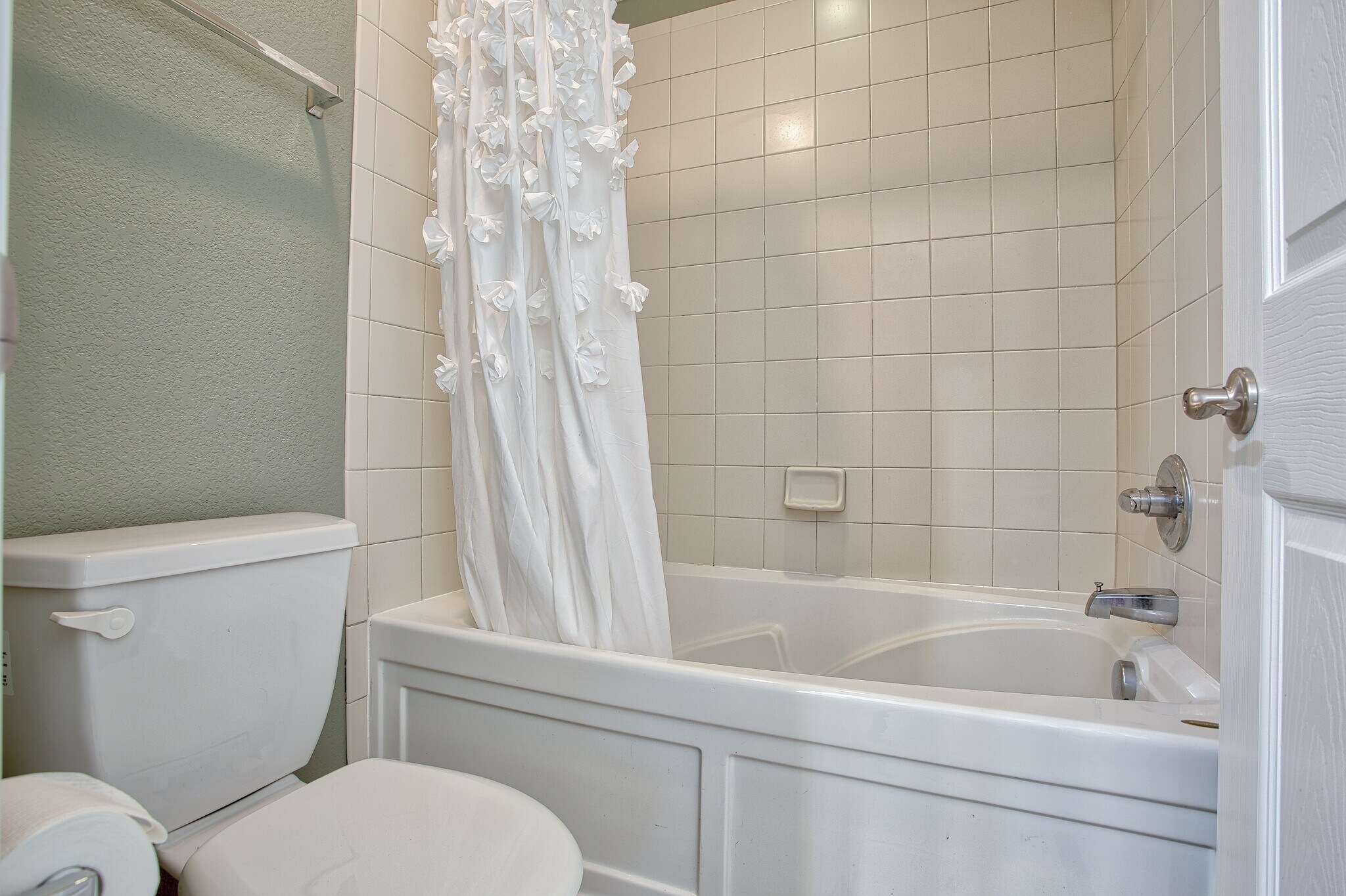 Master bathroom has deep soaking tub and tankless waterheater - 7422 E 7th Ave Unit 14