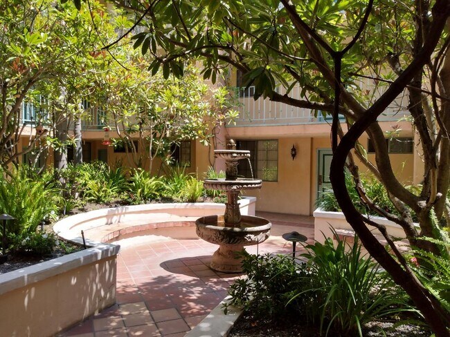 three tiered fountain, lots of humming and other birds - 640 Veteran Ave