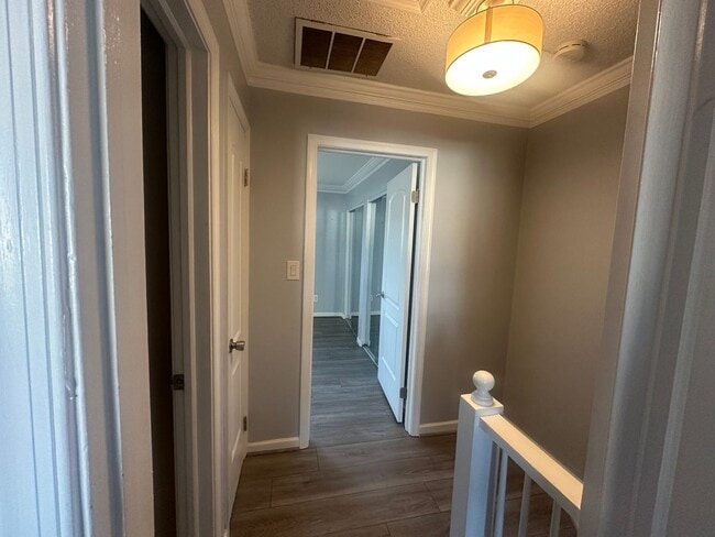 Building Photo - Centrally Located 2 BR Green Townhome with Fenced Patio