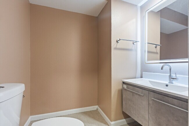 Building Photo - Furnished Option, Modern Comfort & Private Gated Patio!
