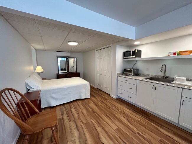 Building Photo - West AVL - Furnished Basement Efficiency