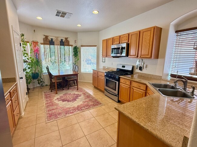 Building Photo - Single-Story Home with Solar, 3-Car Garage & Covered Patio