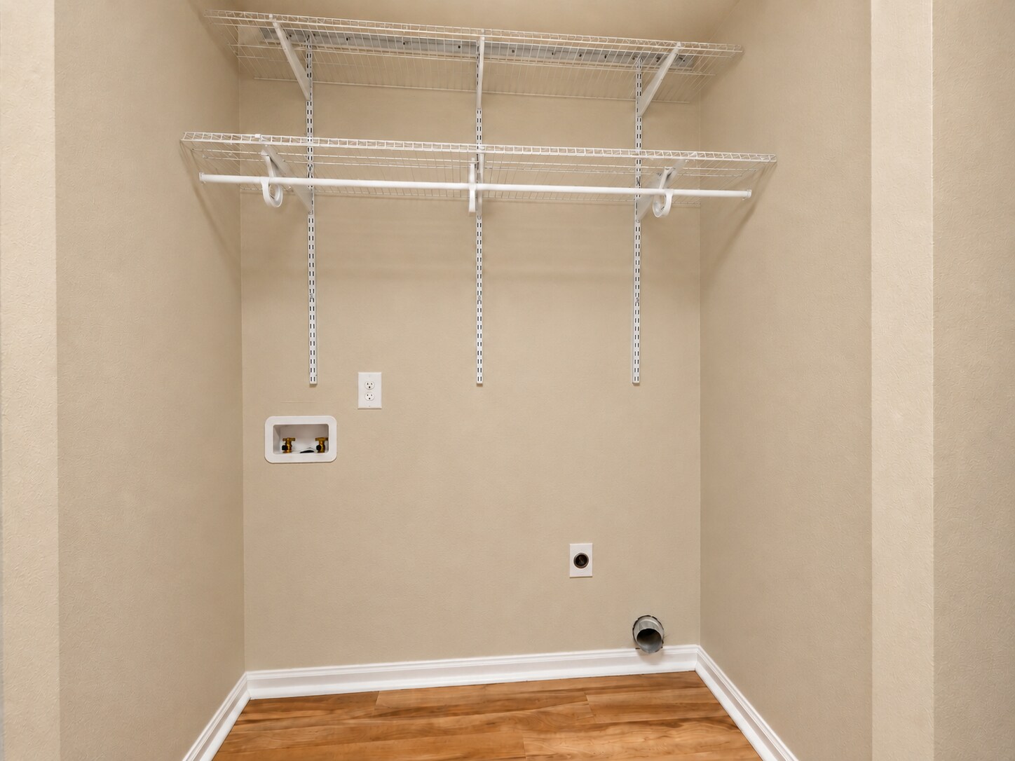 Utility closet downstairs w/Washer/Dryer hookups. - 5484 Pine Top Cir