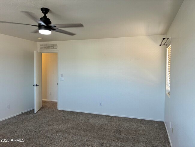 Building Photo - 7287 S Sunrise Way
