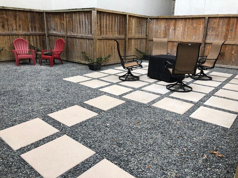 Common space includes fire pit (propane) with ample space for an outdoor grill, etc. - 1712 Blodgett St