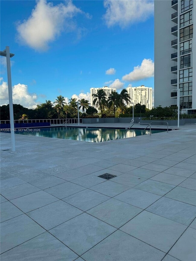 Building Photo - 3675 N Country Club Dr