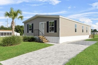 Building Photo - 6571 Hidden Oaks Dr