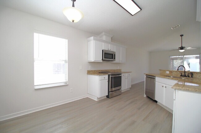 Building Photo - Coming March 14th — Stunning 4-Bed, 2-Bath Sunset Estates Home with Open-Concept Living, Chef’s K...