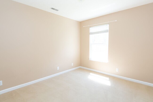Building Photo - Former model home in highly sought after B...