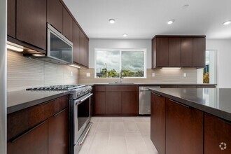 Building Photo - Available now! Brand New 4 Bedroom Townhom...