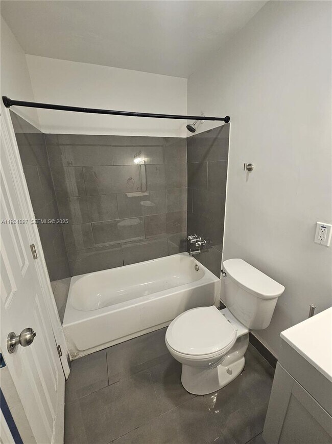 Building Photo - 5615 NW 27th Ct