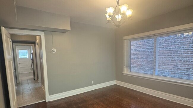Building Photo - 7827 S Colfax Ave