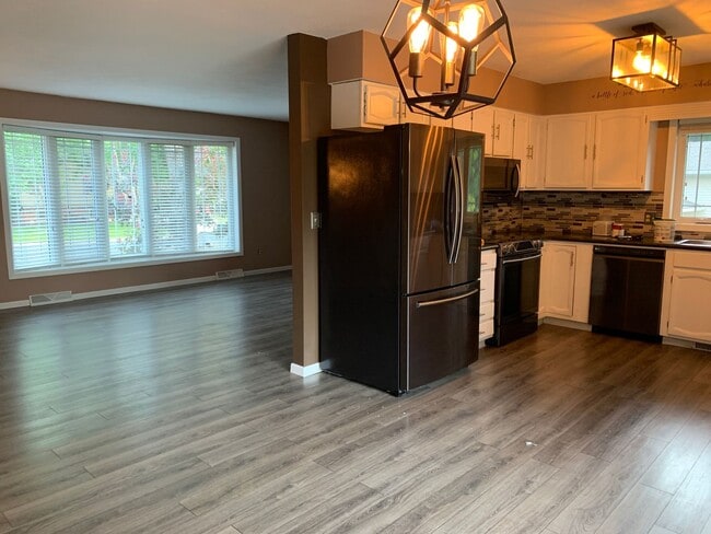 Building Photo - Beautifully Landscaped Split-Level Home