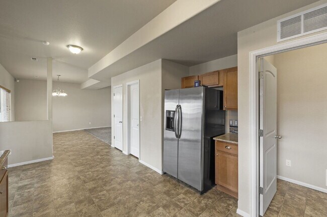 Building Photo - Spacious 4-Bedroom Home with Loft, Solar & Fenced Backyard