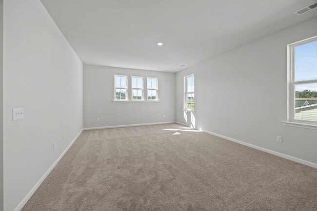 Building Photo - This brand-new home makes a statement from the moment you arrive!