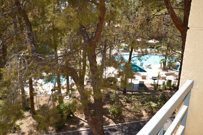 Building Photo - Meridian STUDIO Condo Fully Furnished w/Main Pool View-Lush Green trees in Resort Style Community.