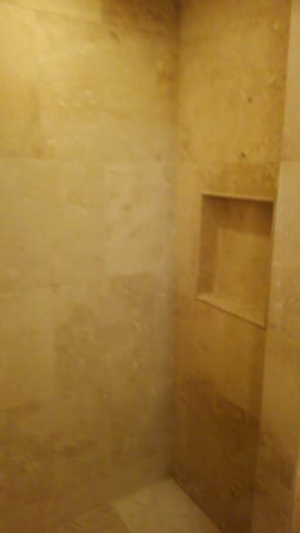 Walk in tile shower - 547 E Grand River Ave