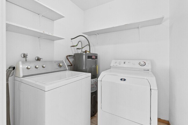 Building Photo - Spacious 2-Bedroom Condo with Fireplace – ...