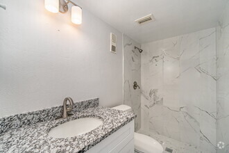 Building Photo - "Chic 2-Bed, 2-Bath Condo with Granite Fin...