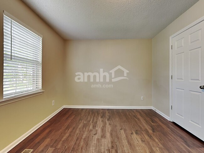 Building Photo - 8703 Coach Wood Ct