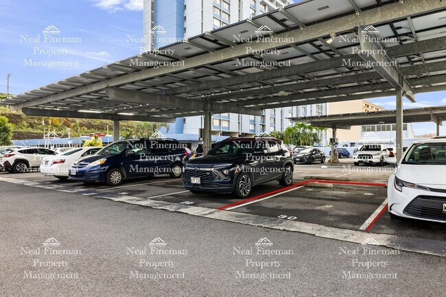 Building Photo - Unfurnished  1 Bed / 1 Bath Condo. 1 assigned covered parking stall. Rent Includes: AC Central, C...