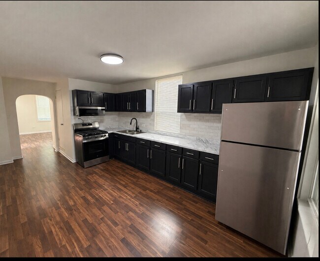 Building Photo - 1617 W 38th Pl