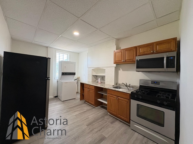Building Photo - Updated 4 BR Home with Spacious Yard & Pre...