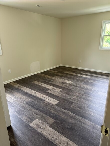 New vinyl flooring throughout apartment - 425 Ryers Ave