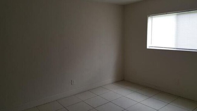 Building Photo - Newport Condominiums - 201