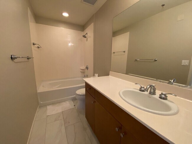 Building Photo - Modern High-Rise Condo with Stunning City and Mountain Views-Near LV Strip, Allegiant Stadium, To...