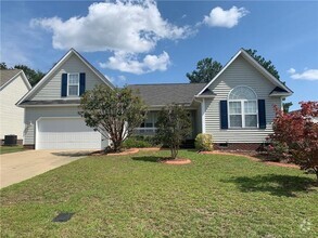 Building Photo - Lovely 3 Bedroom Home