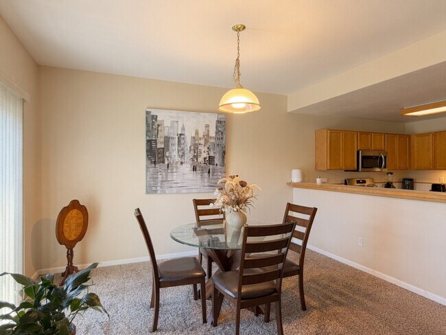 Building Photo - Lakeside 3 Bed/2.5 Bath Townhome in Gateway Community! Quiet, Scenic Living in The Heart Of Denver!