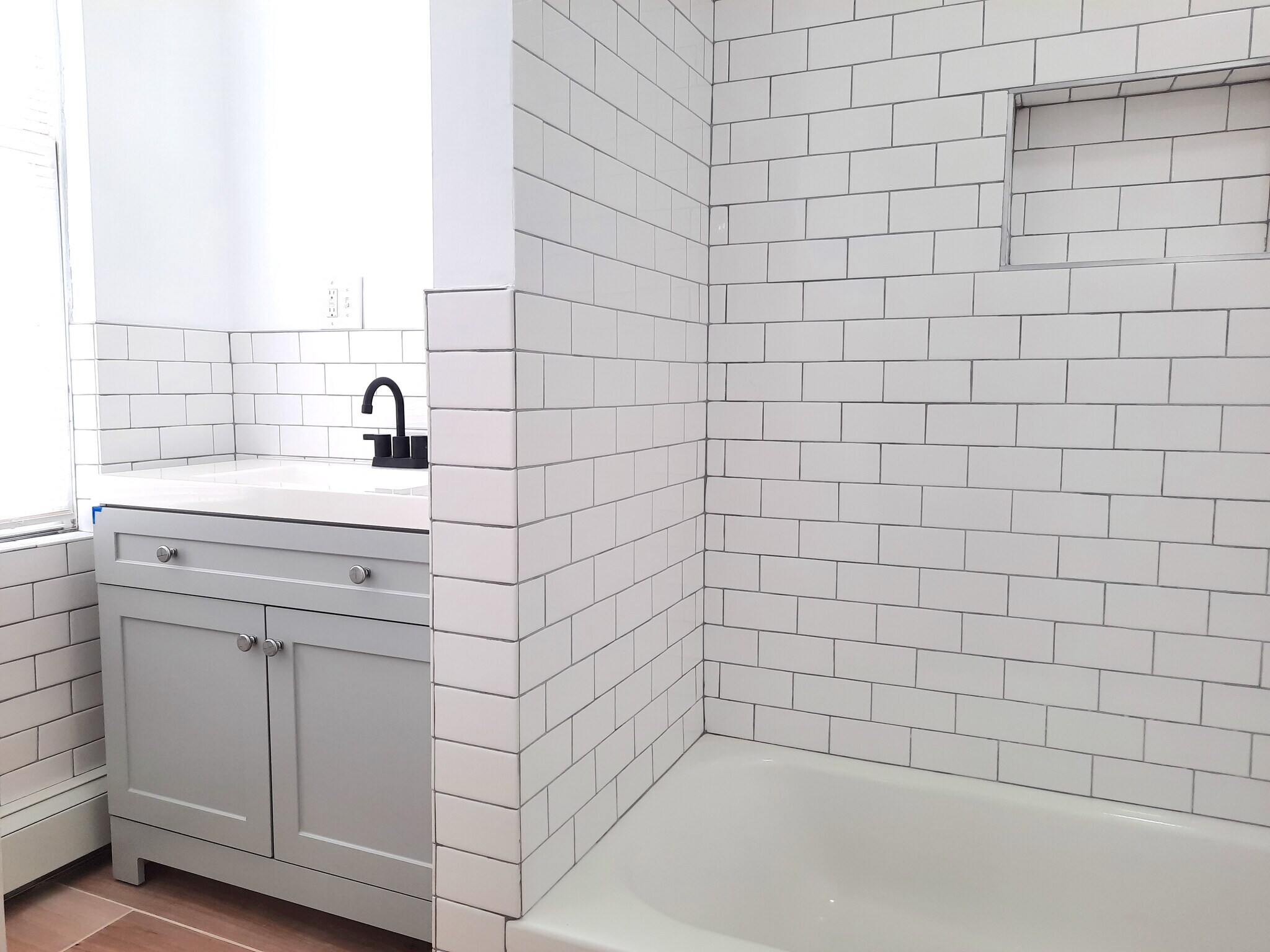Renovated bathroom with tub - 1205 Bergenline Ave