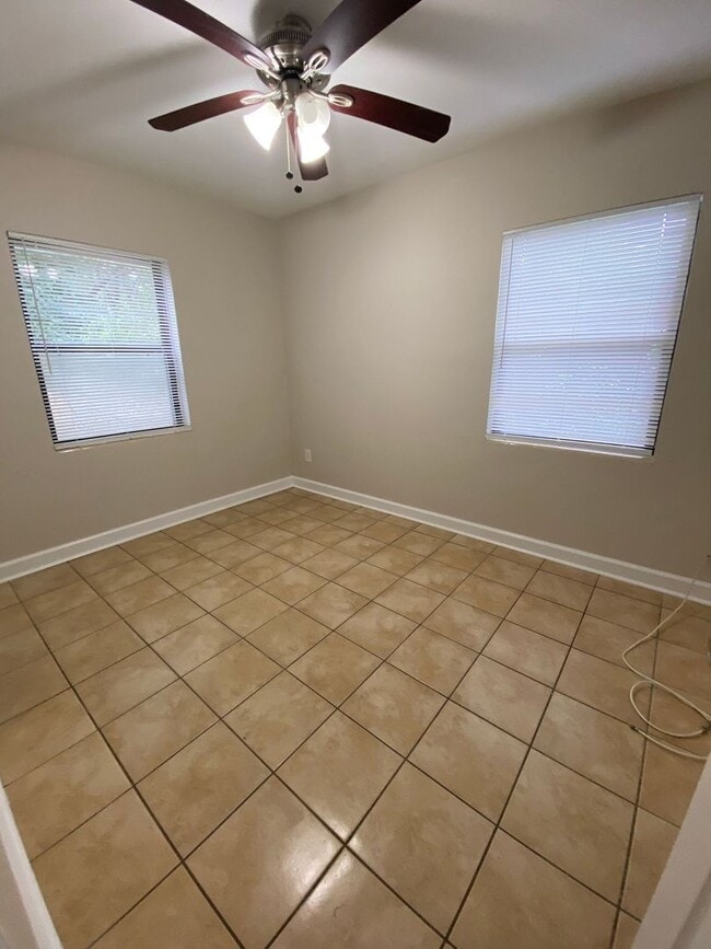 Building Photo - Charming home with a New Kitchen, tile flo...