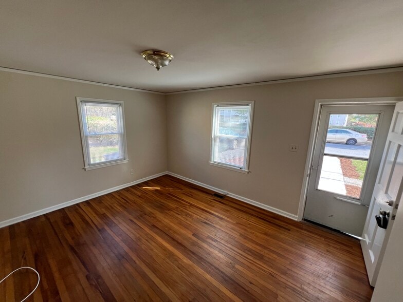 Living Room with 2 windows and door - 602 Warren St