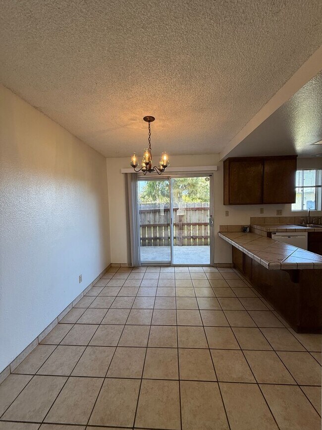 Building Photo - Large Two Story Condo with Two Car Detache...