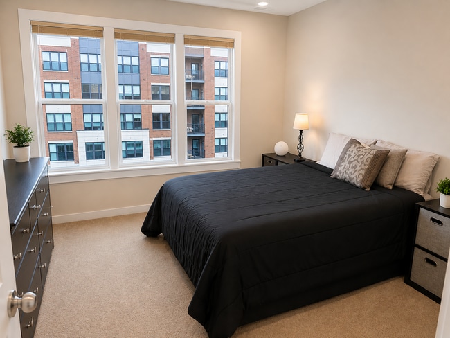 Building Photo - Sophisticated Rockville Corner Condo with Resort-Style Amenities, 2 Garage Parking Spaces