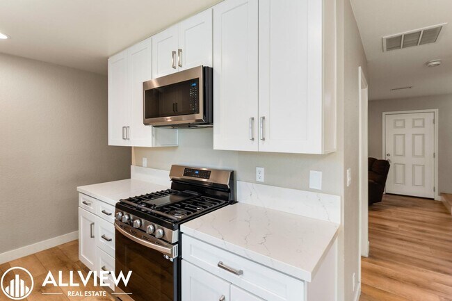 Building Photo - Two-Story Gem in Huntington Beach - Modern Upgrades & Private Outdoor Space