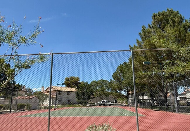 Building Photo - TWO BEDROOM TOWNHOME IN THE LAKES WITH GARAGE AND ATTACHED CARPORT