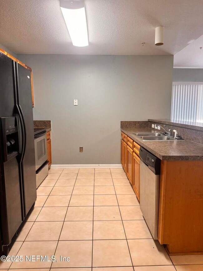 Building Photo - 6984 Ortega Woods Dr