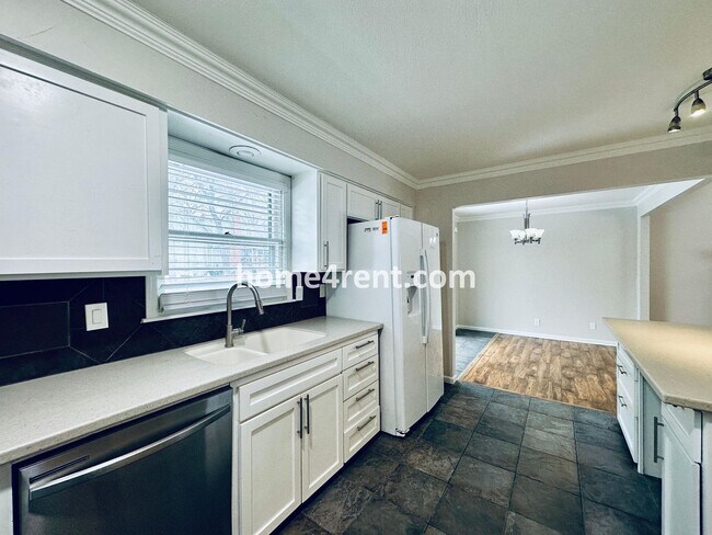 Building Photo - A Lovely Four Bedroom Home in Lenexa w/ Wood Floors, Finished Basement and a Fenced Yard!